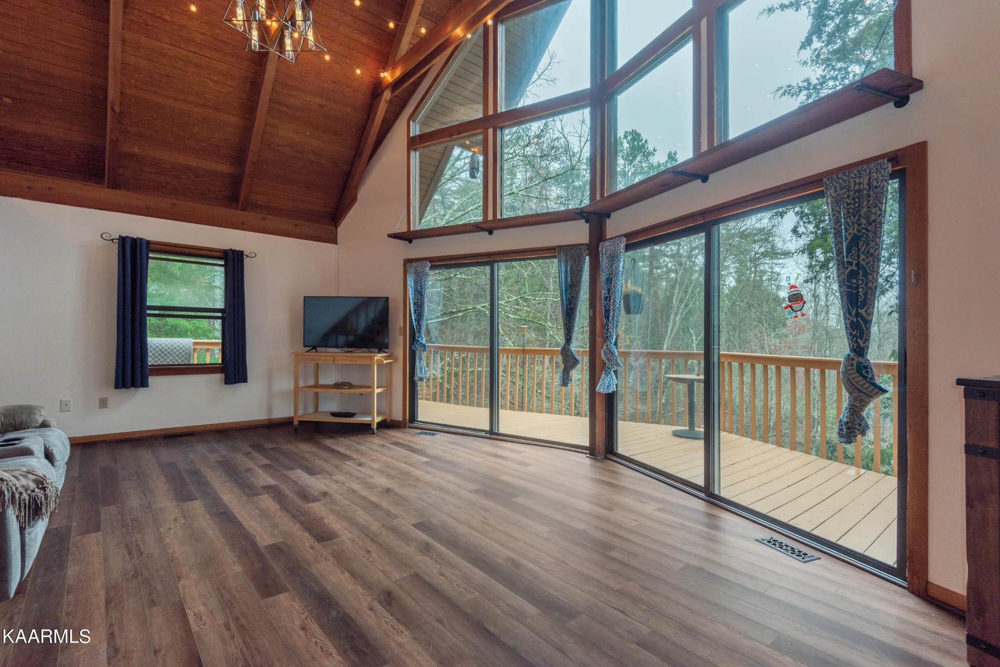2356 Black Oak Ridge Road Sevierville, TN 37876 - Photo 8 of 33 a view of a room with wooden floor and balcony