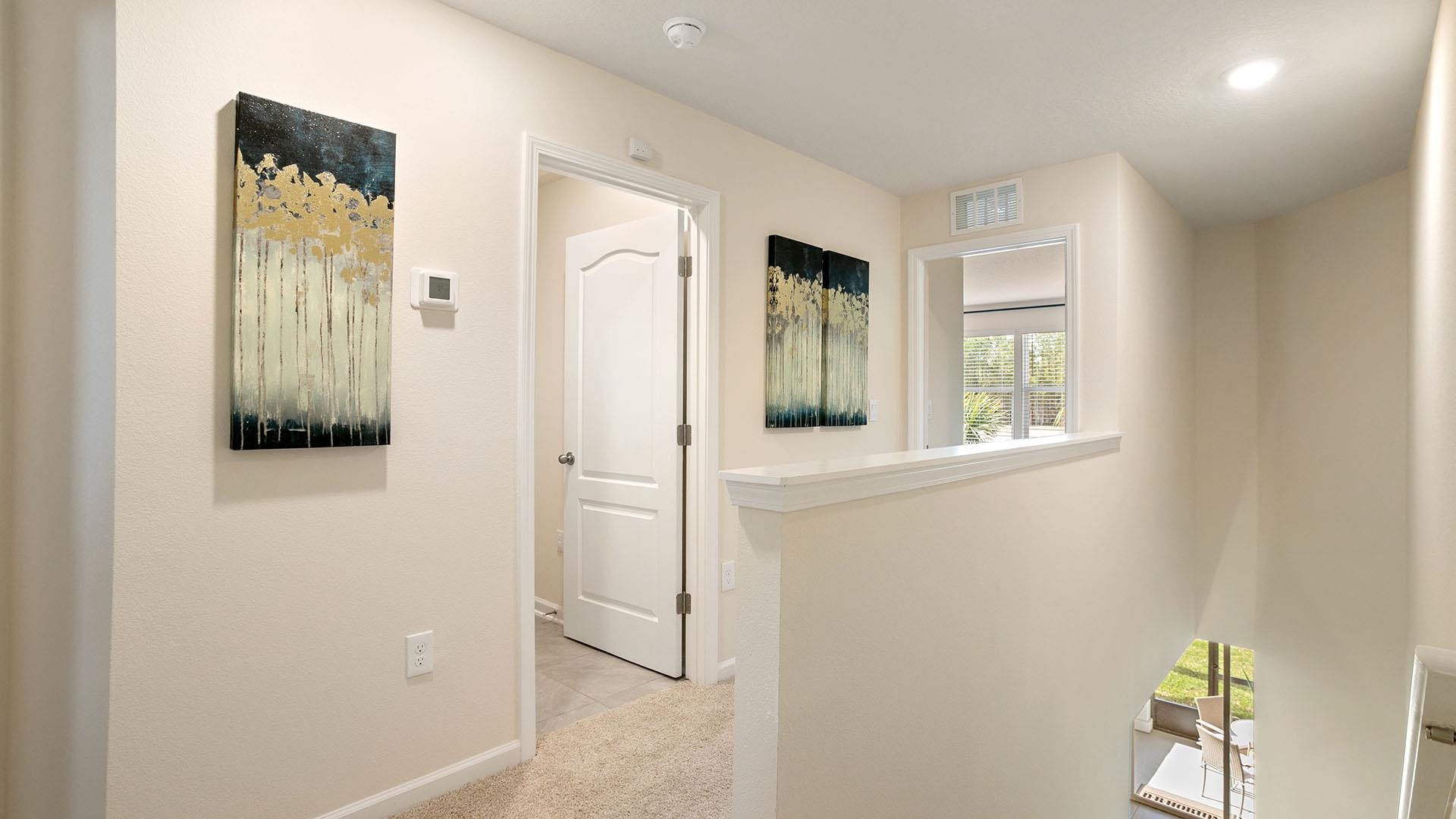 483 Redbud Road Palm Coast, FL 32137 - Photo 15 of 32 a view of entryway with wooden floor and cabinet