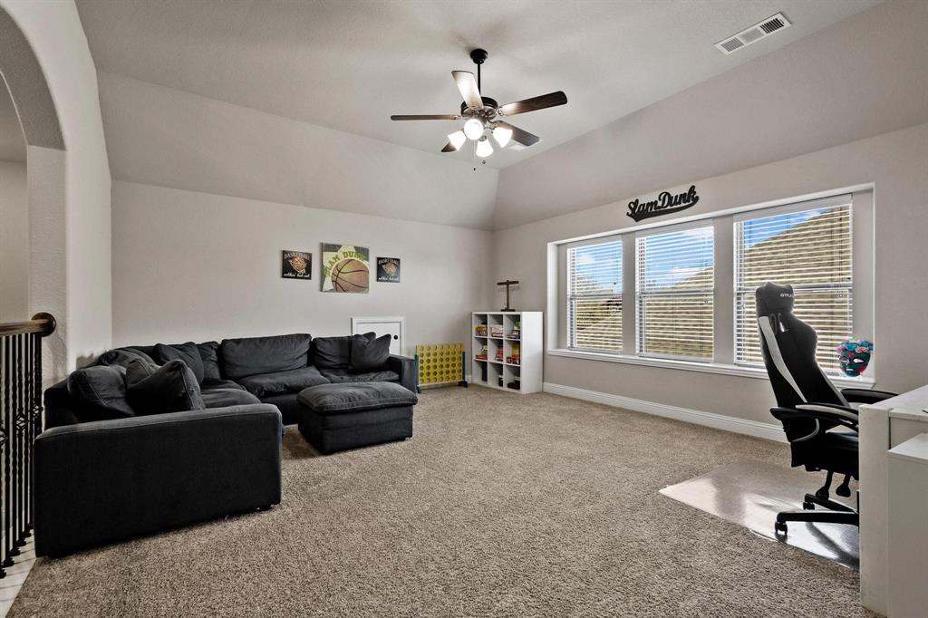 320 Sherbrook Street Van Alstyne, TX 75495 - Photo 21 of 38 Living, game, family great room. High ceilings, all windows in home are low E high efficiency tilt sash windows.