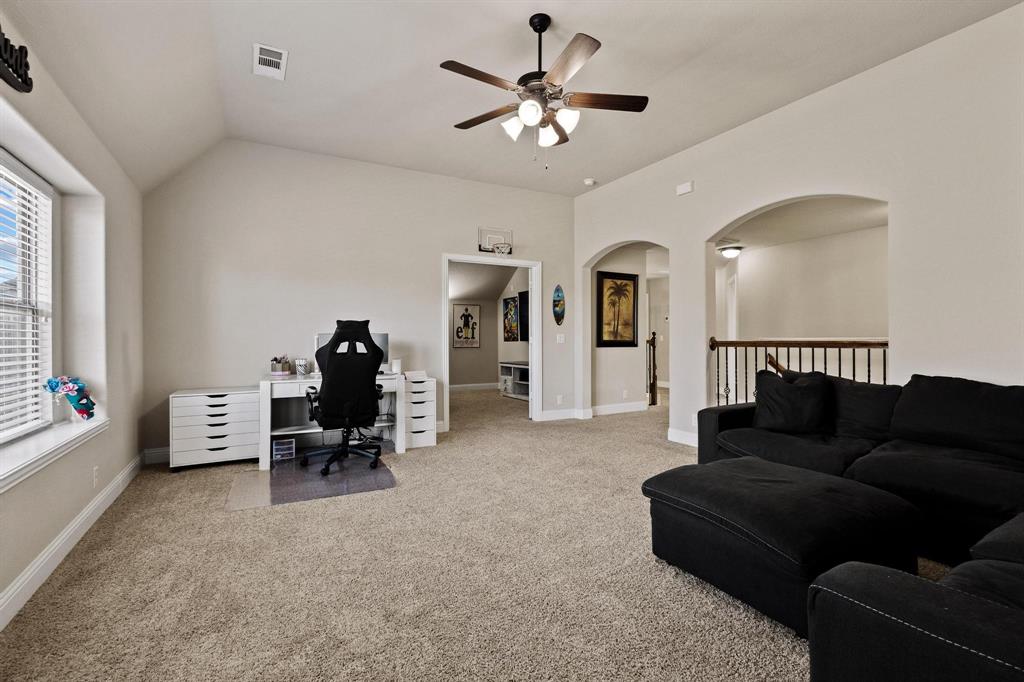 320 Sherbrook Street Van Alstyne, TX 75495 - Photo 22 of 38 Space and more space. Architectural details, bull nosed corners. Media room view.
