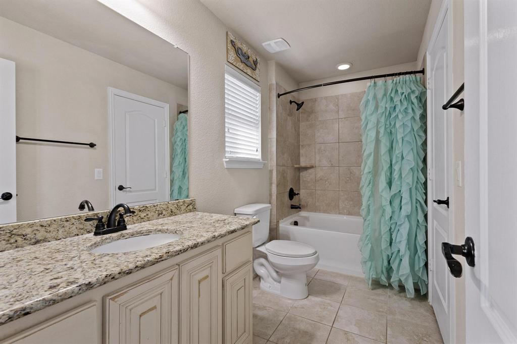 320 Sherbrook Street Van Alstyne, TX 75495 - Photo 26 of 38 Full ensuite bath for 2nd primary. Large granite vanity, upgraded cabinets, and huge walk in closet.