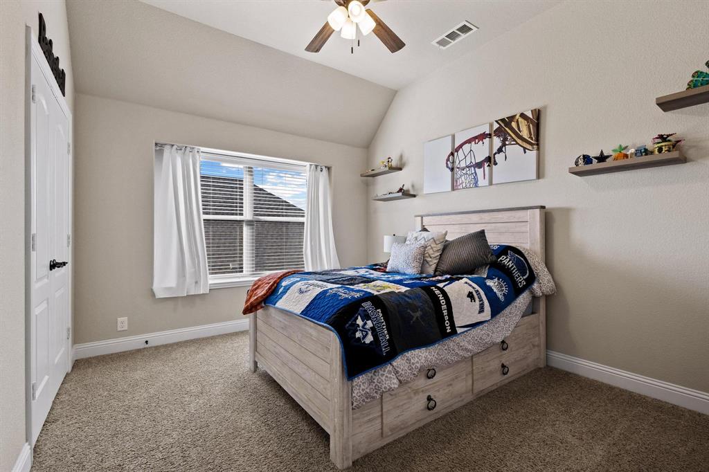 320 Sherbrook Street Van Alstyne, TX 75495 - Photo 27 of 38 One of 3 bedrooms upstairs. Love the higher ceilings, neutral palette walls.