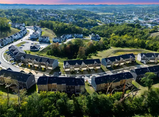 a view of a swimming pool with a lawn chairs