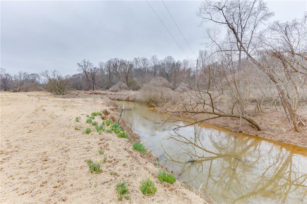 0 Hendrix Road Cumming, GA 30040 - Photo 14 of 28 a view of a yard with snow on the road
