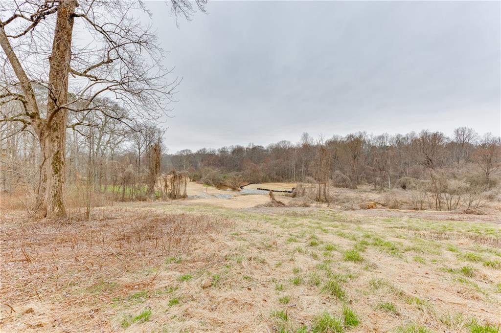 0 Hendrix Road Cumming, GA 30040 - Photo 16 of 28 a view of dirt field with trees