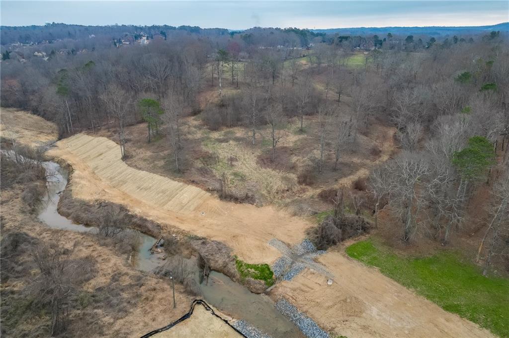 0 Hendrix Road Cumming, GA 30040 - Photo 23 of 28 a view of a dry yard with trees