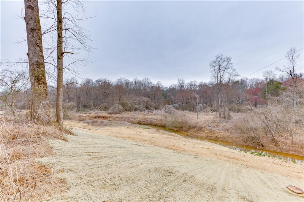 0 Hendrix Road Cumming, GA 30040 - Photo 10 of 28 a view of a yard with snow on the road