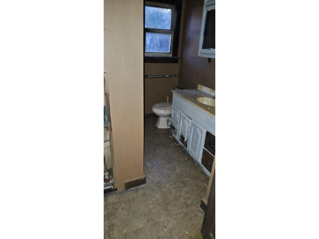 700 North Boone Street Olney, IL 62450 - Photo 12 of 12 a bathroom with a toilet