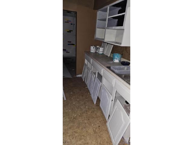 700 North Boone Street Olney, IL 62450 - Photo 10 of 12 a bathroom with sink and mirror