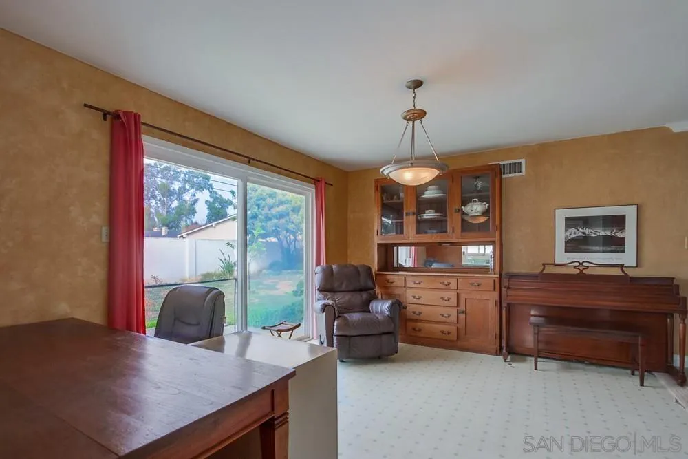 1800 Guevara Road Carlsbad, CA 92008 - Photo 14 of 29 a view of a workspace with furniture and a window