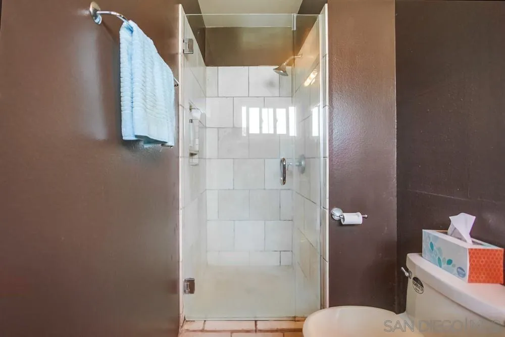 1800 Guevara Road Carlsbad, CA 92008 - Photo 16 of 29 a bathroom with a toilet and a shower