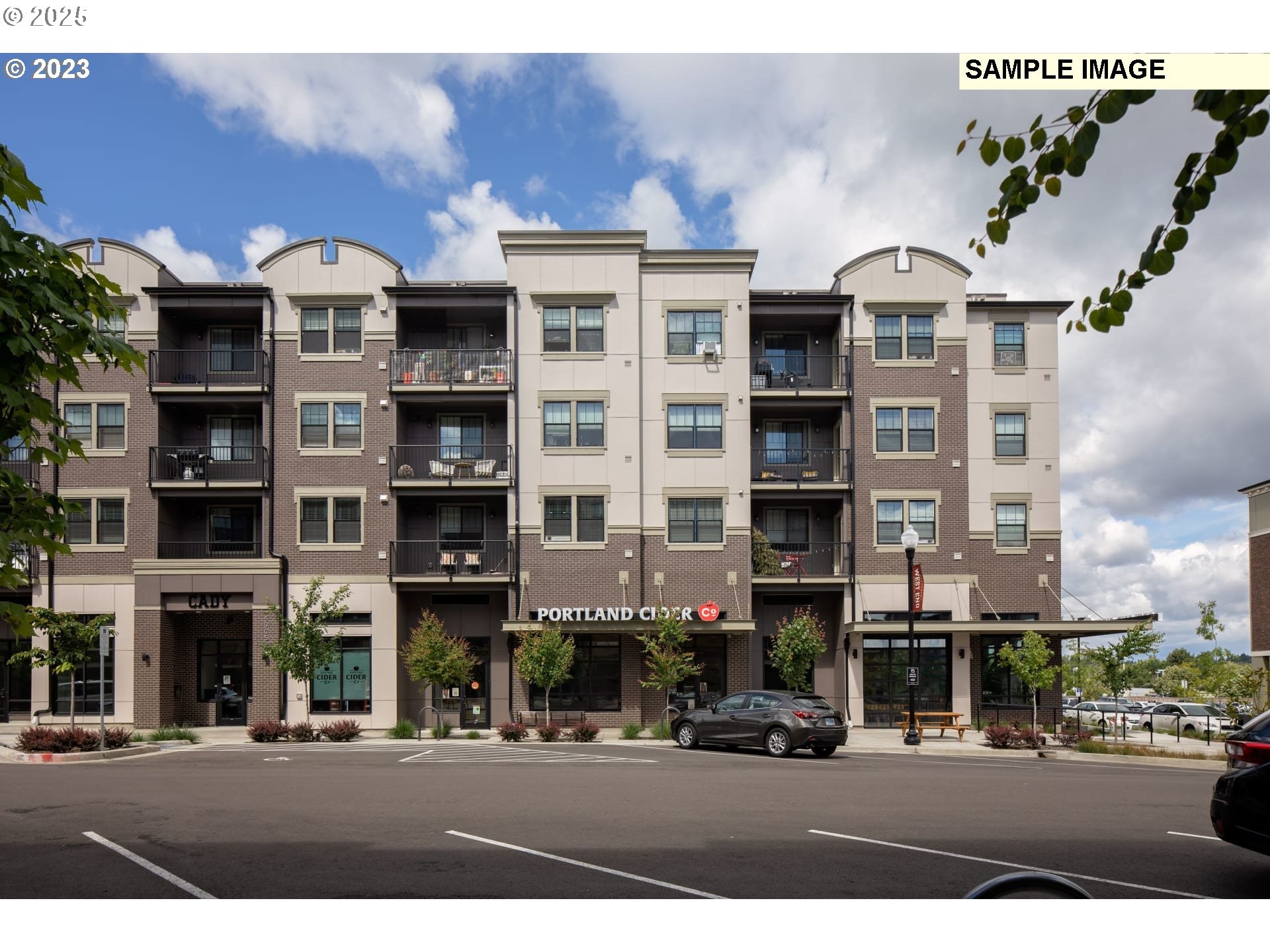 16658 Southwest Jean Louise Road Tigard, OR 97223 - Photo 18 of 19 a front view of a building with a street