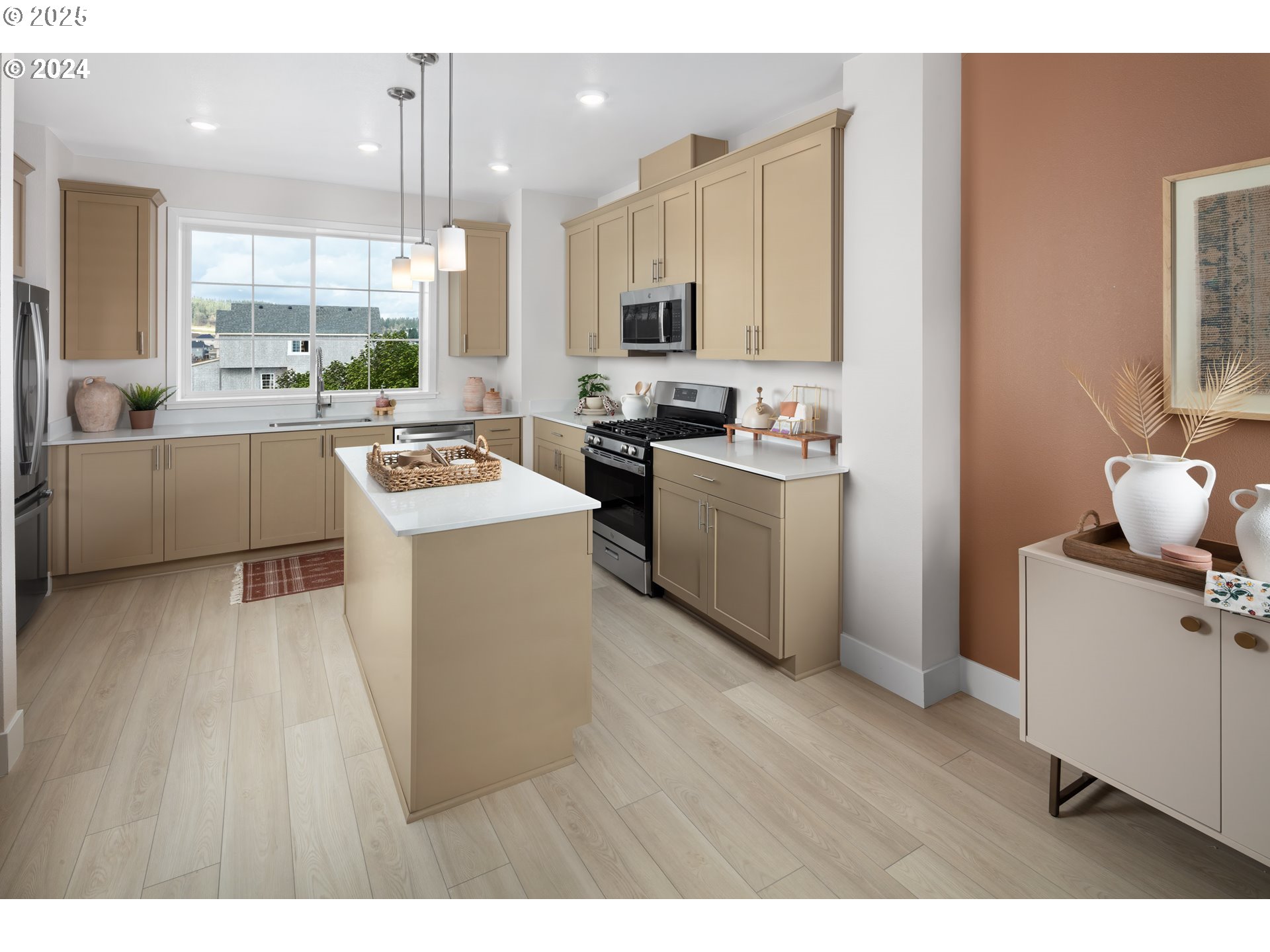 16658 Southwest Jean Louise Road Tigard, OR 97223 - Photo 9 of 19 a kitchen with a sink cabinets and wooden floor