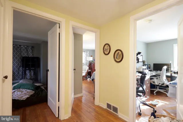 a bathroom with a sink a toilet and window