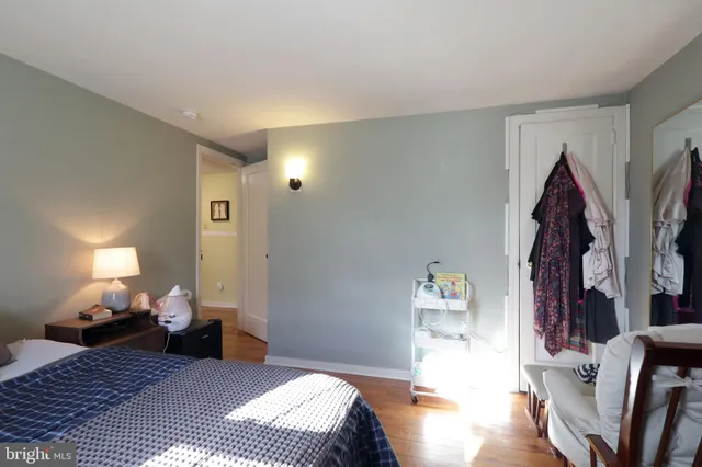 a work room with furniture and a window