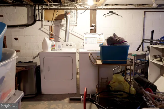 a view of a roof deck with table and chairs with wooden floor and fence