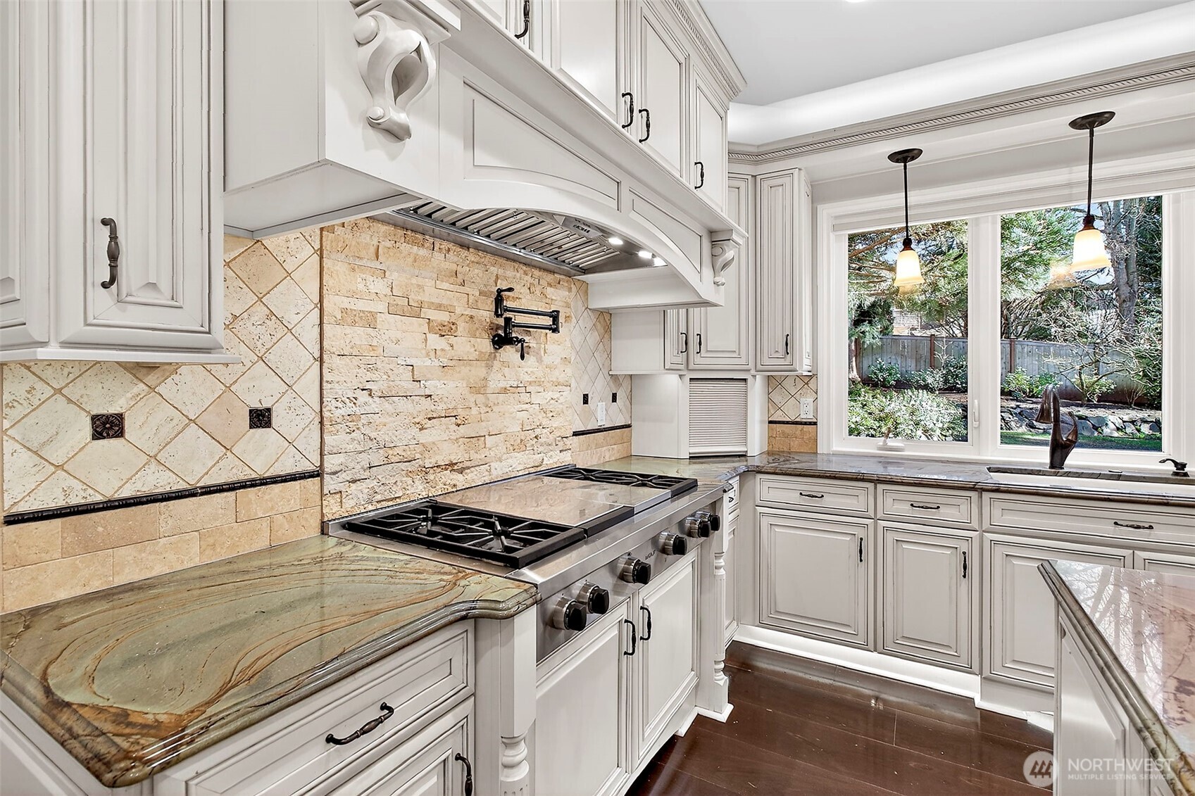 34529 5th Place Southwest Federal Way, WA 98023 - Photo 14 of 40 a kitchen with stainless steel appliances granite countertop a stove and a sink