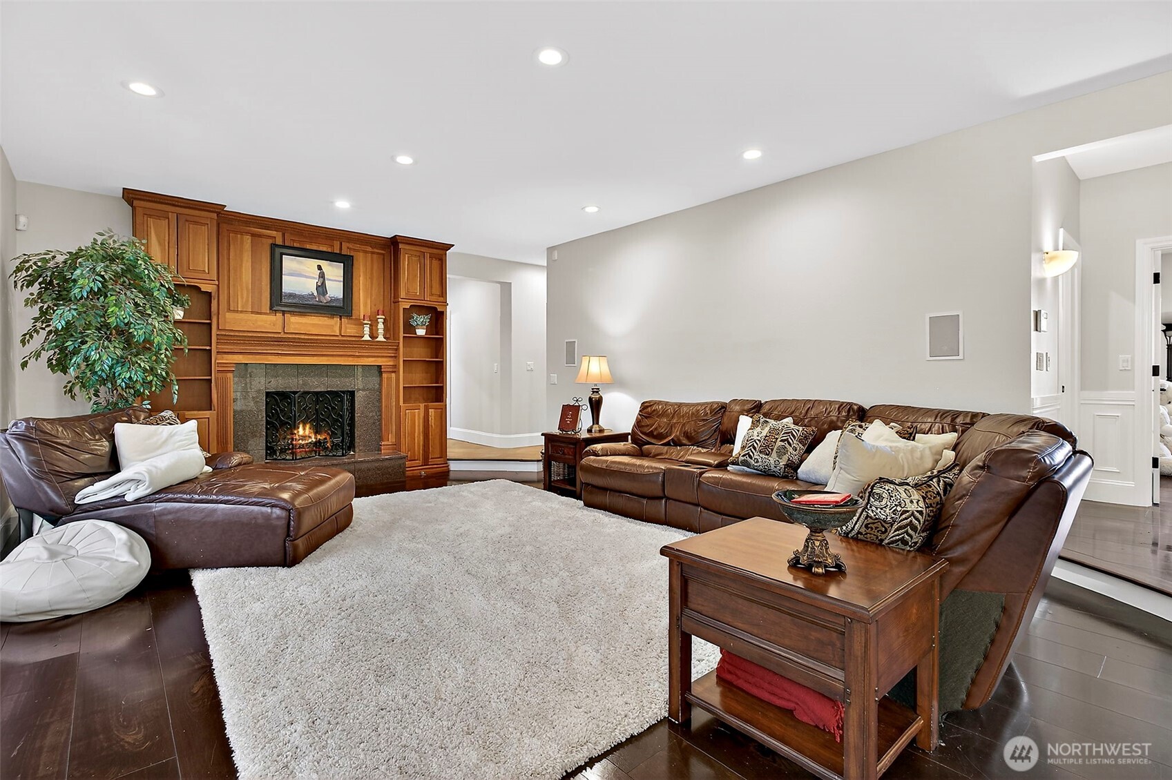 34529 5th Place Southwest Federal Way, WA 98023 - Photo 19 of 40 a living room with furniture a fireplace and a flat screen tv