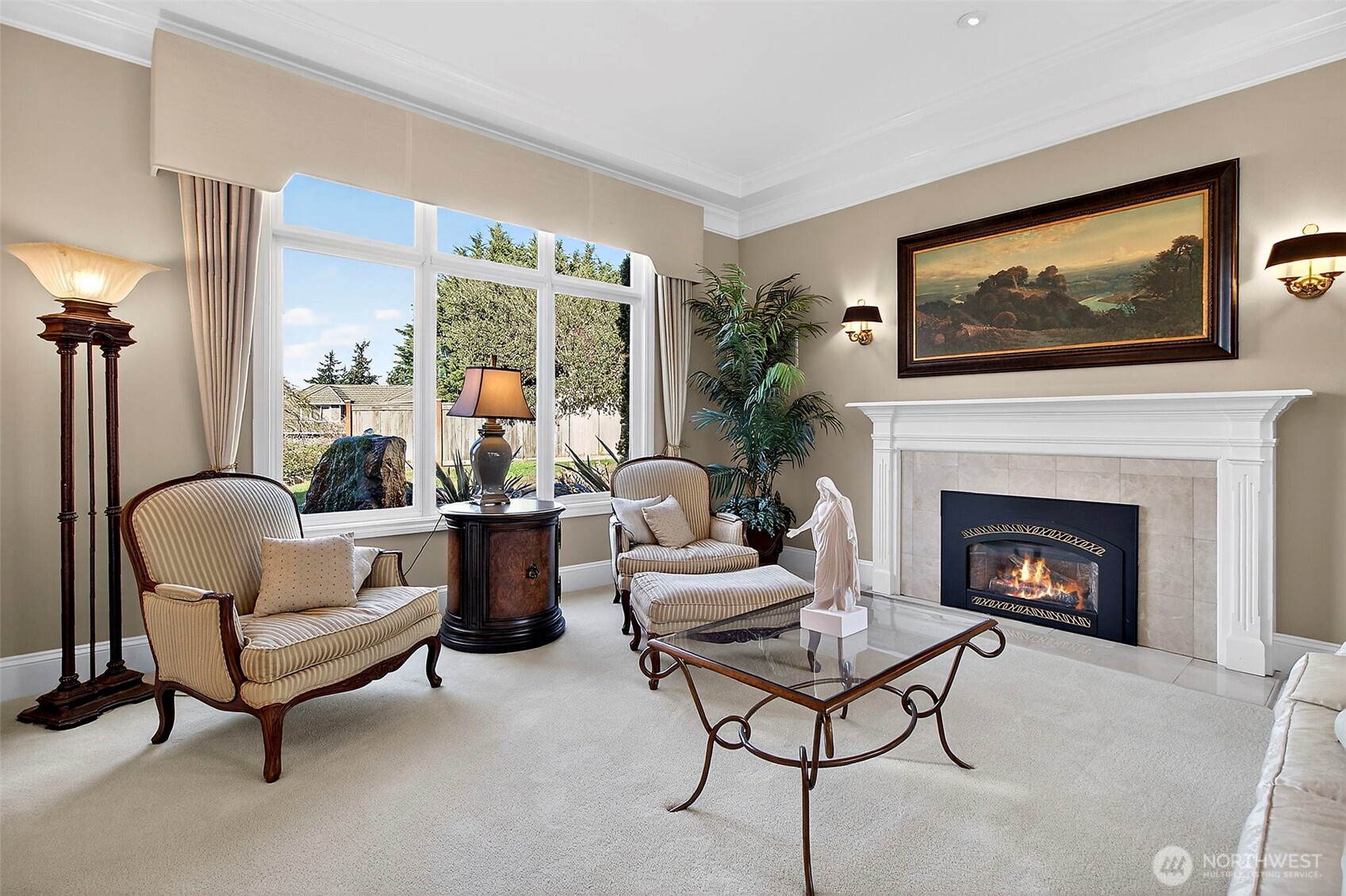 34529 5th Place Southwest Federal Way, WA 98023 - Photo 4 of 40 a living room with furniture a flat screen tv and a fireplace