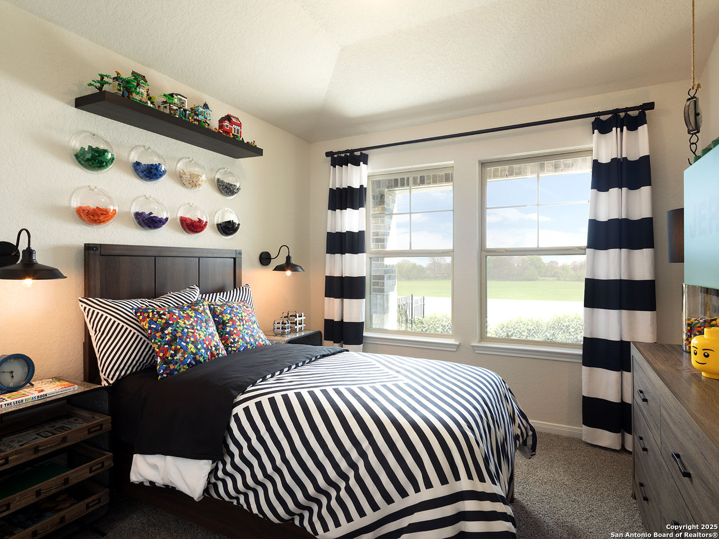 124 Perciful Avenue Cibolo, TX 78108 - Photo 11 of 14 a bedroom with a bed and a window