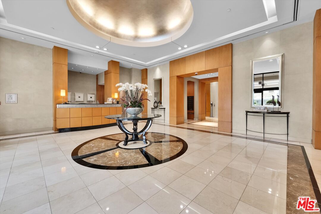10445 Wilshire Boulevard, Unit 904 Los Angeles, CA 90024 - Photo 3 of 40 a view of a livingroom with furniture and windows