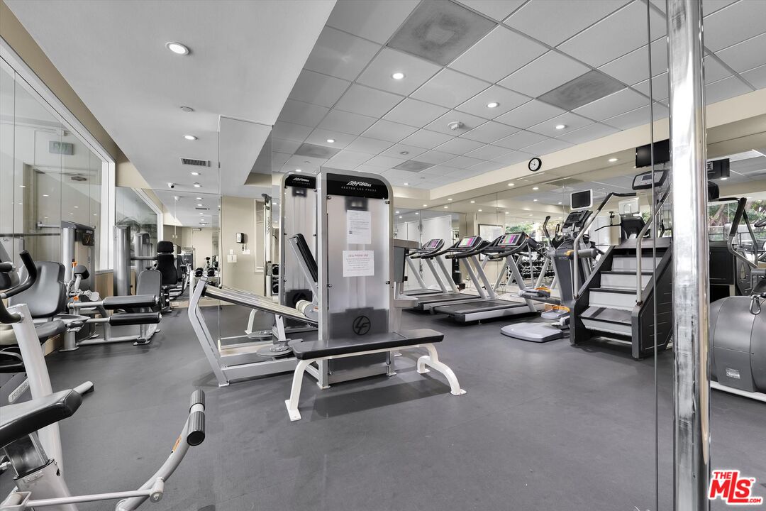 10445 Wilshire Boulevard, Unit 904 Los Angeles, CA 90024 - Photo 38 of 40 a view of a room with gym equipment