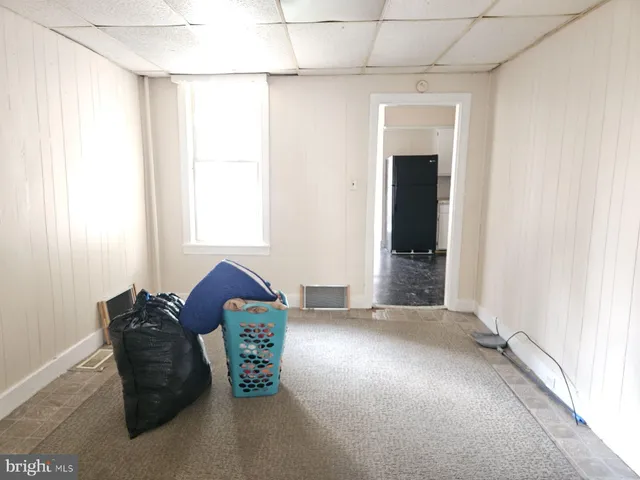 a view of entryway with livingroom