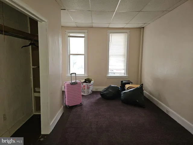 a room with furniture and window