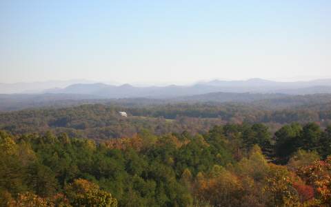 Lot 3 Price Road Blue Ridge, GA 30513 - Photo 1 of 1 an aerial view of houses covered in trees