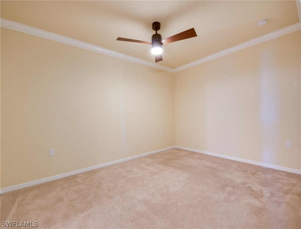 9727 Acqua Court, Unit 413 Naples, FL 34113 - Photo 13 of 35 wooden floor in an empty room