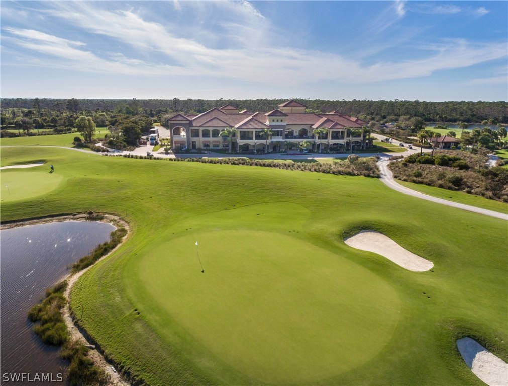 9727 Acqua Court, Unit 413 Naples, FL 34113 - Photo 21 of 35 a view of a city with lawn chairs