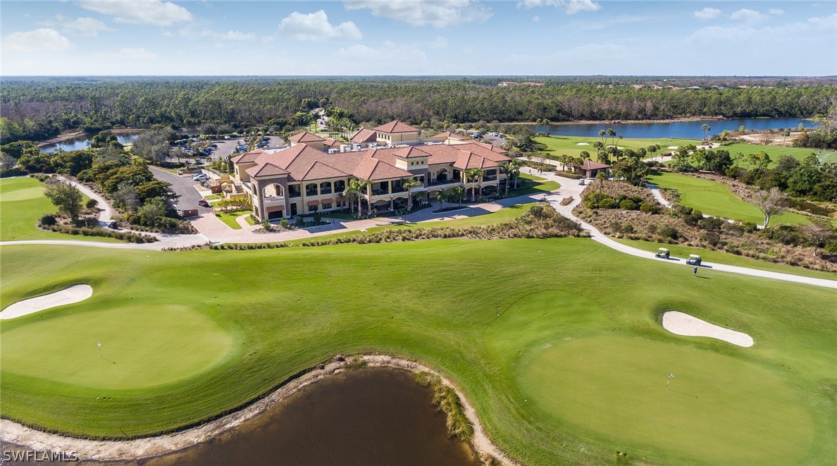 9727 Acqua Court, Unit 413 Naples, FL 34113 - Photo 23 of 35 an aerial view of a residential houses with outdoor space swimming pool and outdoor seating