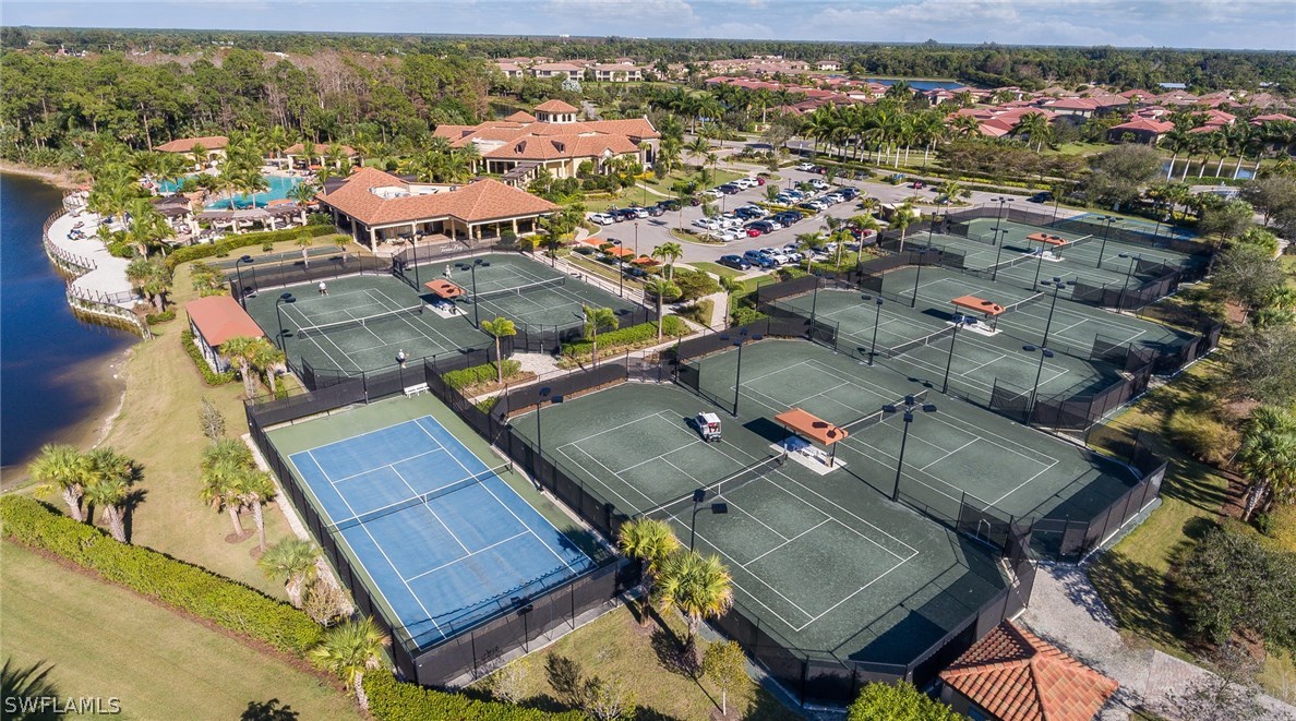 9727 Acqua Court, Unit 413 Naples, FL 34113 - Photo 27 of 35 an aerial view of a residential houses with outdoor space