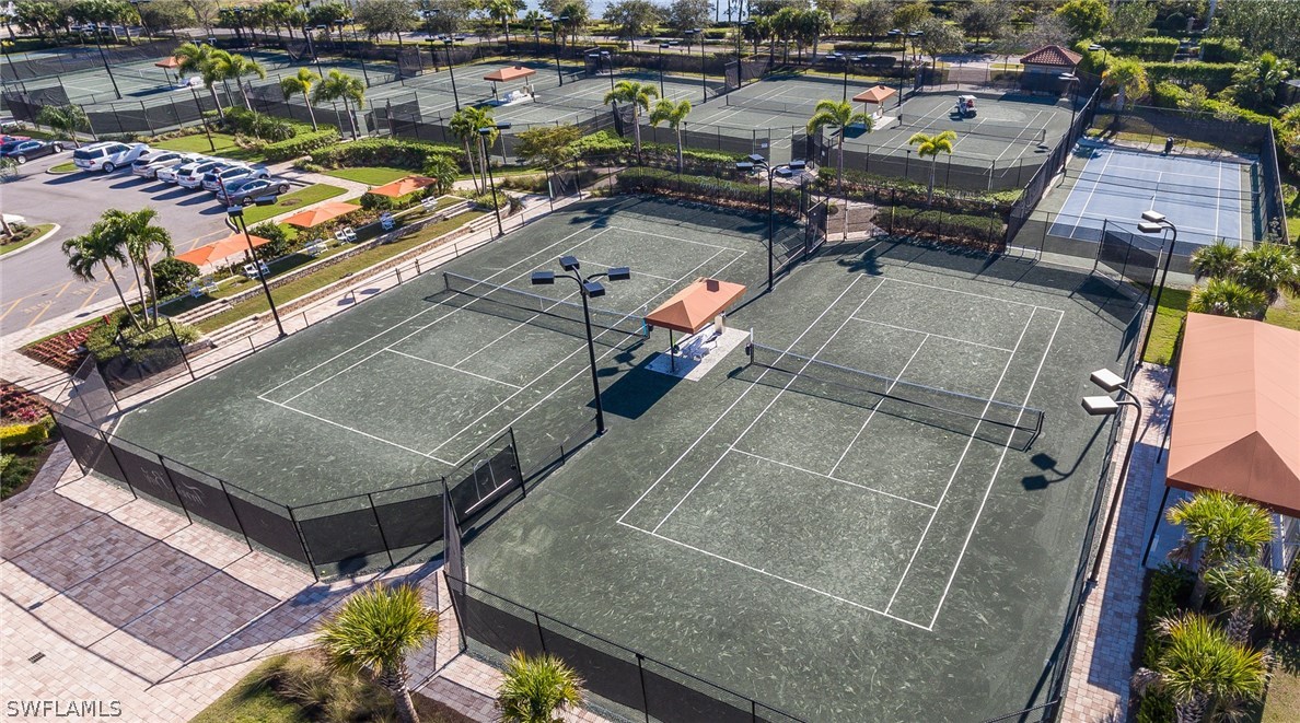 9727 Acqua Court, Unit 413 Naples, FL 34113 - Photo 28 of 35 an aerial view of a house with lake view