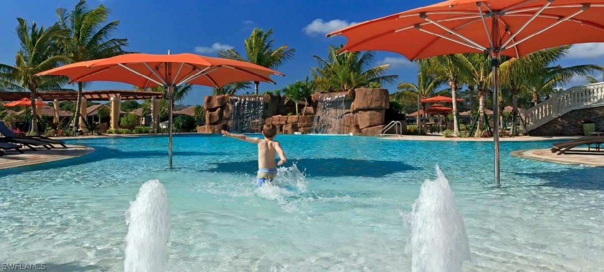 9727 Acqua Court, Unit 413 Naples, FL 34113 - Photo 32 of 35 a view of a backyard with swimming pool