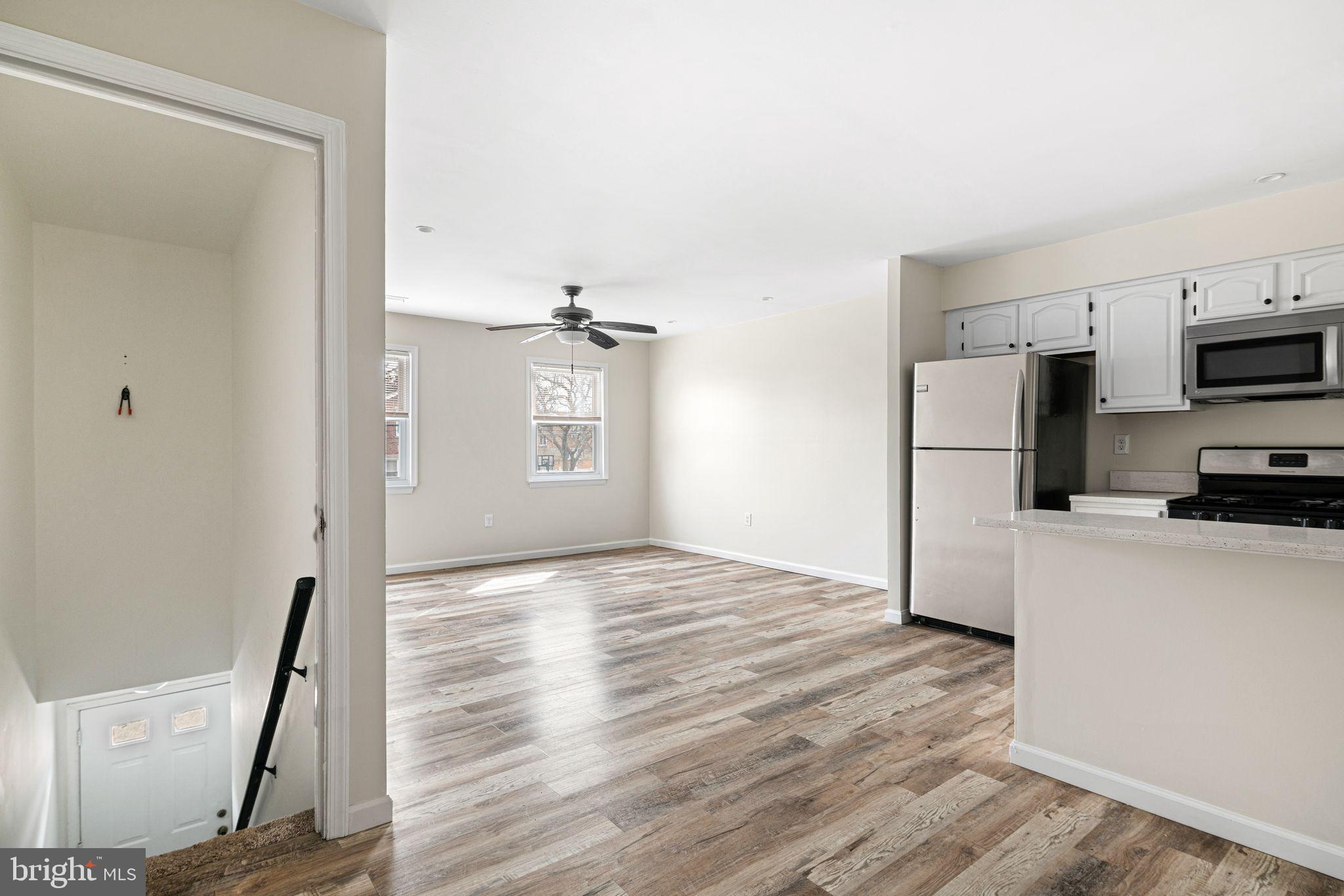 7926 Cottage Street Philadelphia, PA 19136 - Photo 16 of 29 a view of kitchen and wooden floor