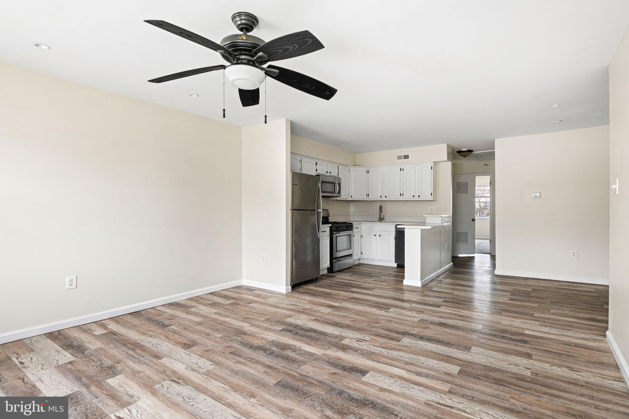 7926 Cottage Street Philadelphia, PA 19136 - Photo 17 of 29 a view of a kitchen with wooden floor