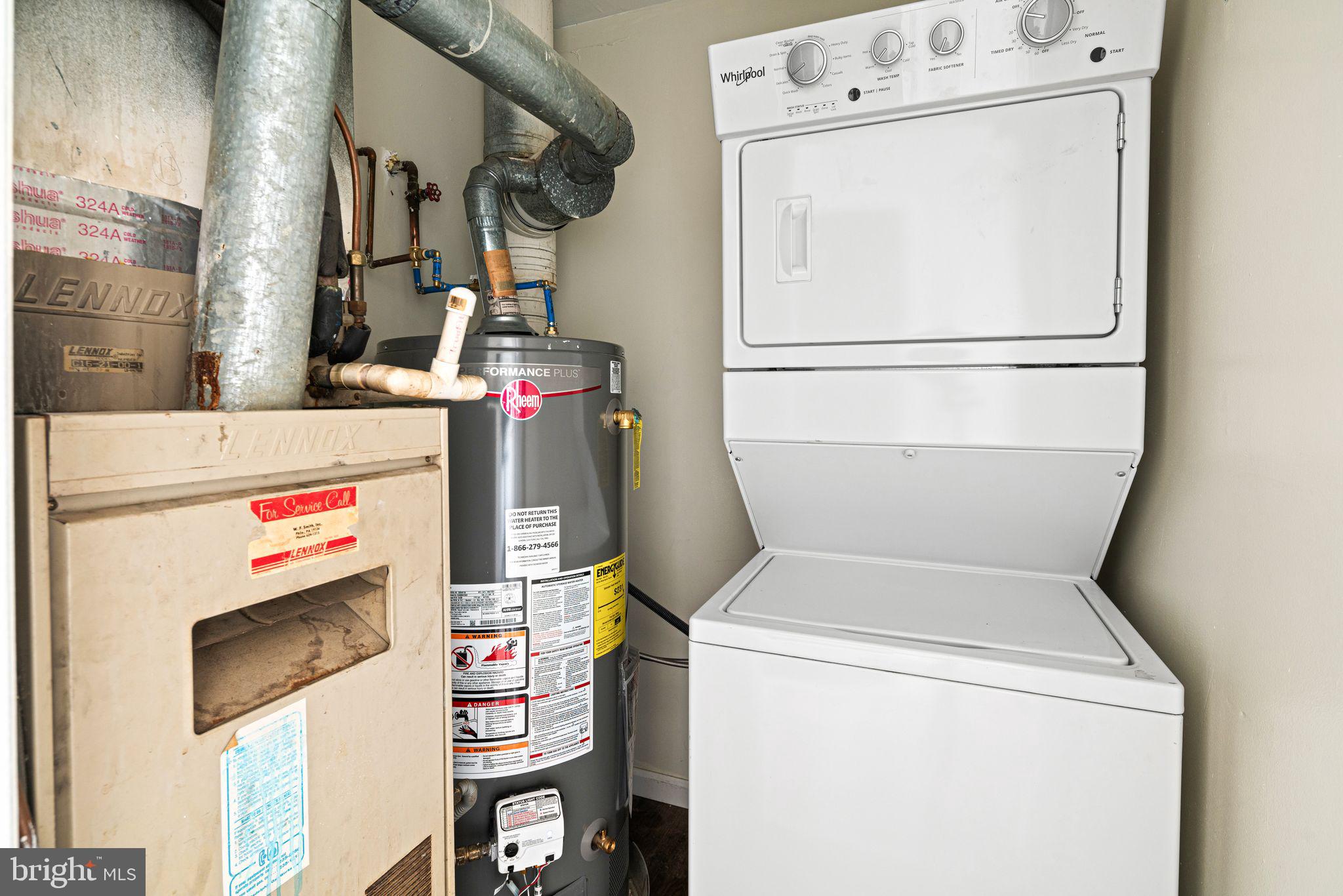 7926 Cottage Street Philadelphia, PA 19136 - Photo 22 of 29 a utility room with dryer and washer