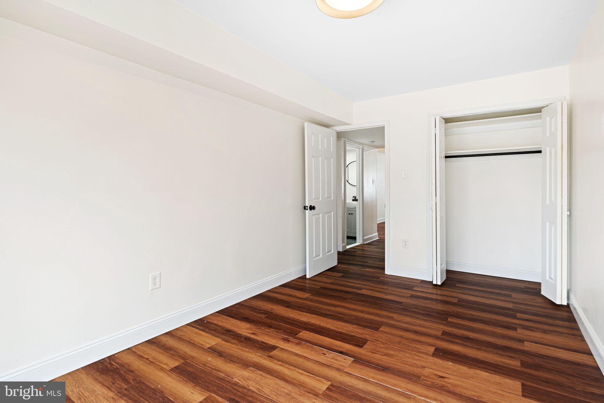 7926 Cottage Street Philadelphia, PA 19136 - Photo 10 of 29 a view of an empty room with wooden floor