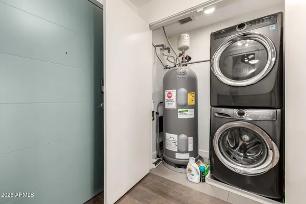 a utility room with dryer and washer