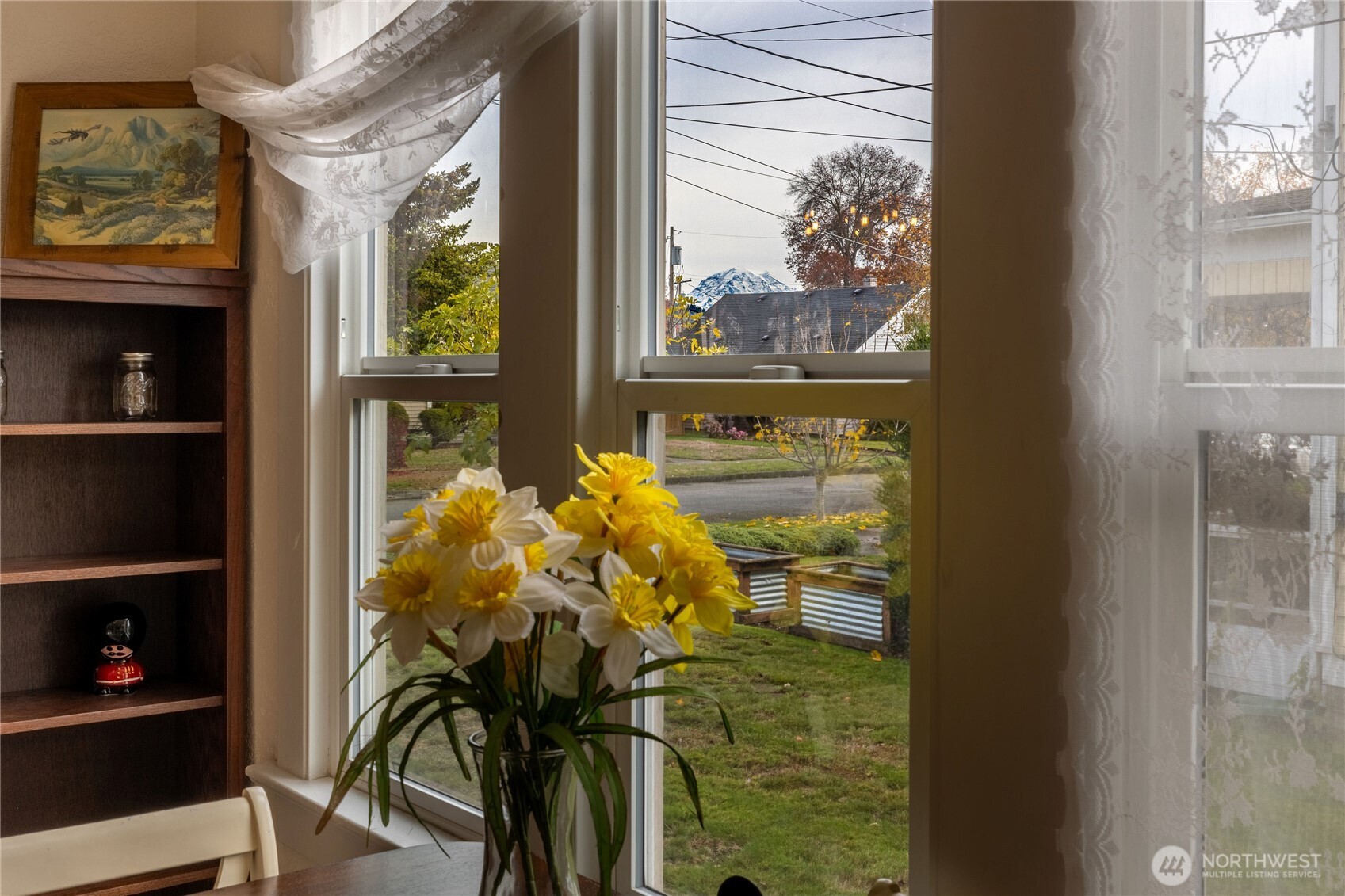 318 4th Street Southwest Puyallup, WA 98371 - Photo 12 of 40 a view of a room with wooden floor and windows