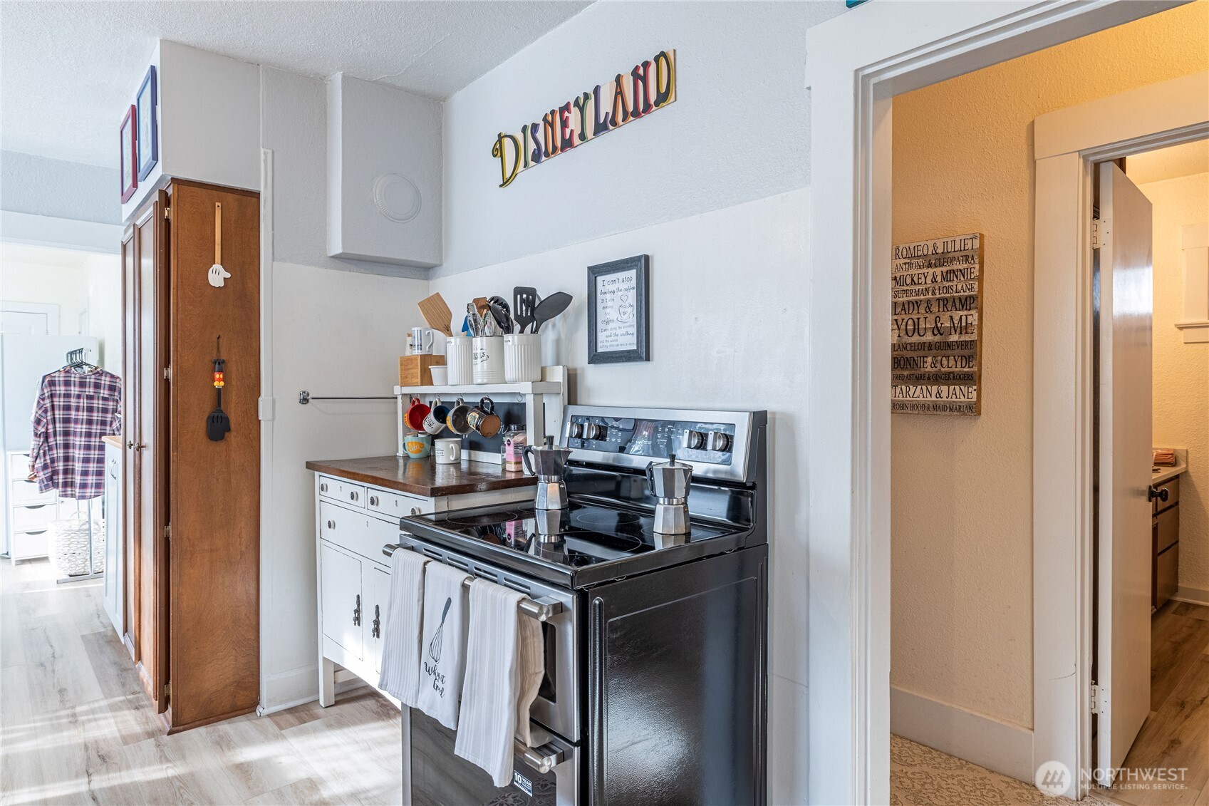 318 4th Street Southwest Puyallup, WA 98371 - Photo 14 of 40 a kitchen with stainless steel appliances granite countertop a stove and a refrigerator