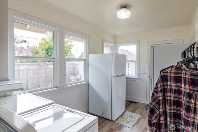 a bathroom with a sink a mirror and shower