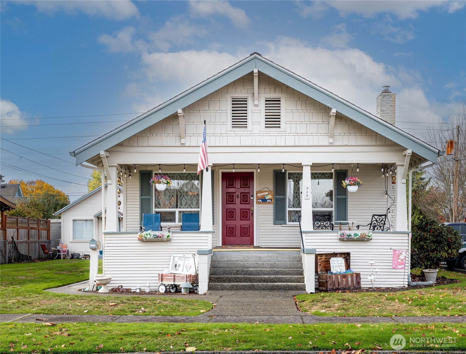 318 4th Street Southwest Puyallup, WA 98371 - Photo 2 of 40 a front view of a house with a yard