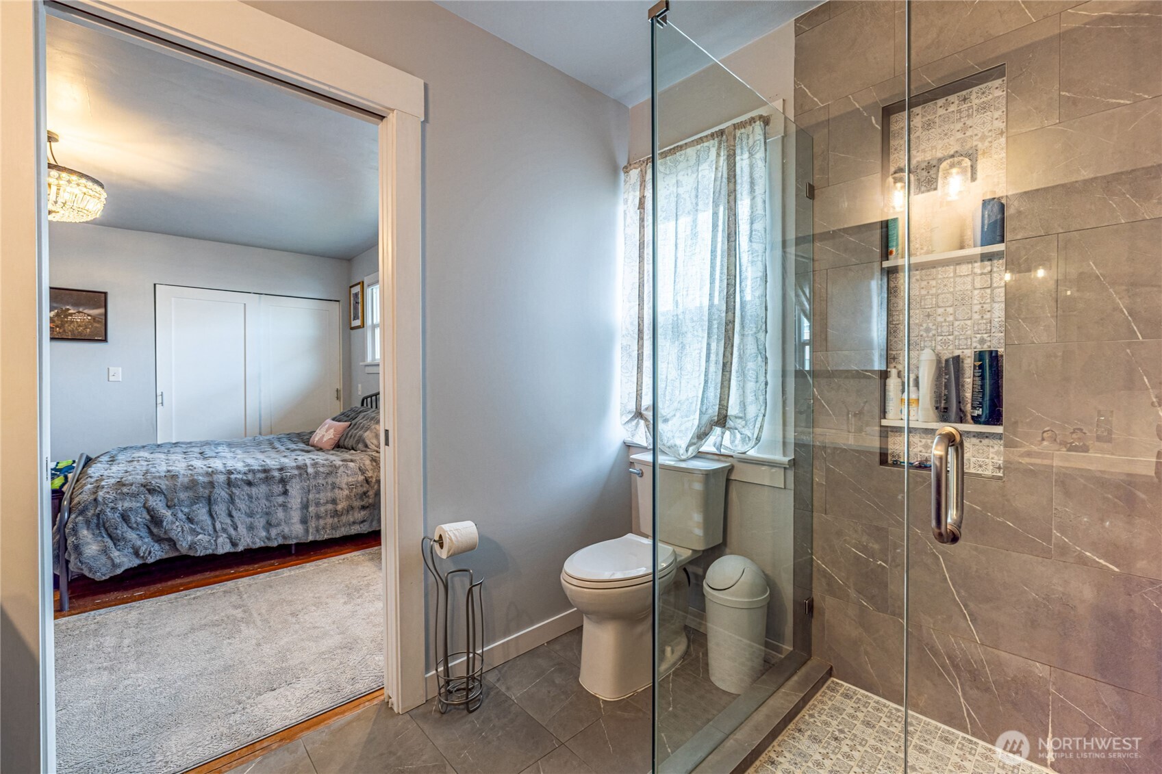 318 4th Street Southwest Puyallup, WA 98371 - Photo 27 of 40 a bathroom with a sink toilet and shower