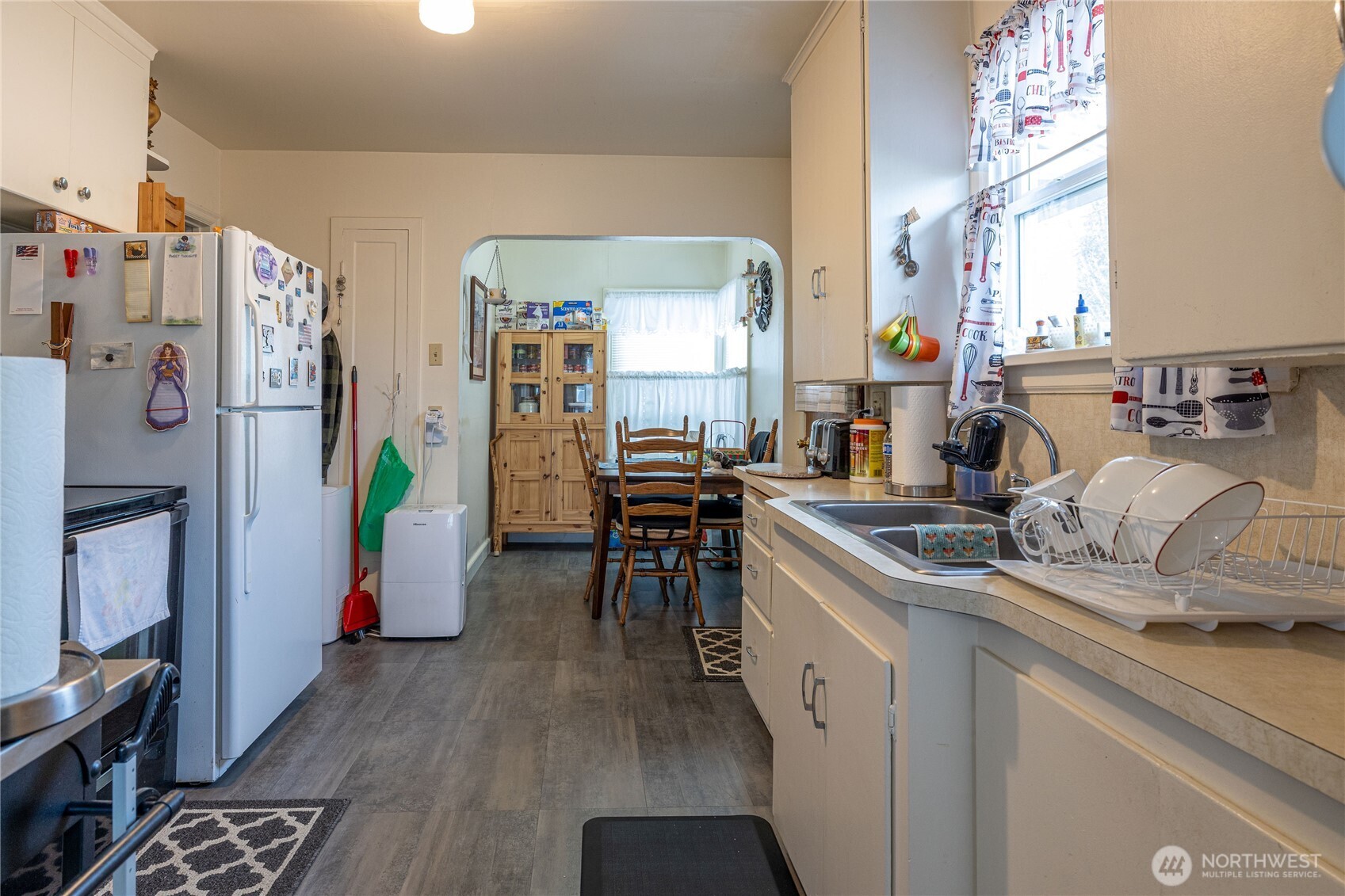 318 4th Street Southwest Puyallup, WA 98371 - Photo 35 of 40 a kitchen with a sink and appliances