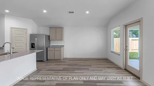 a view of a kitchen cabinets a sink and a window in a room