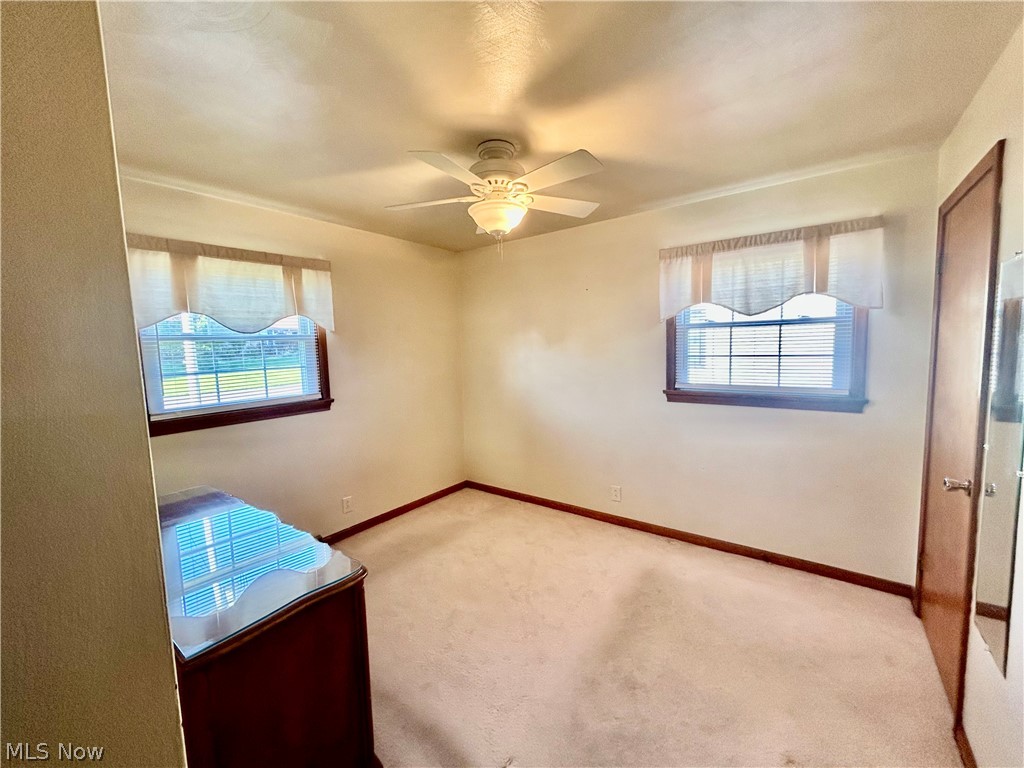501 Edison Street Struthers, OH 44471 - Photo 13 of 23 Double windows, large closet, ceiling fan hardwood under carpeting