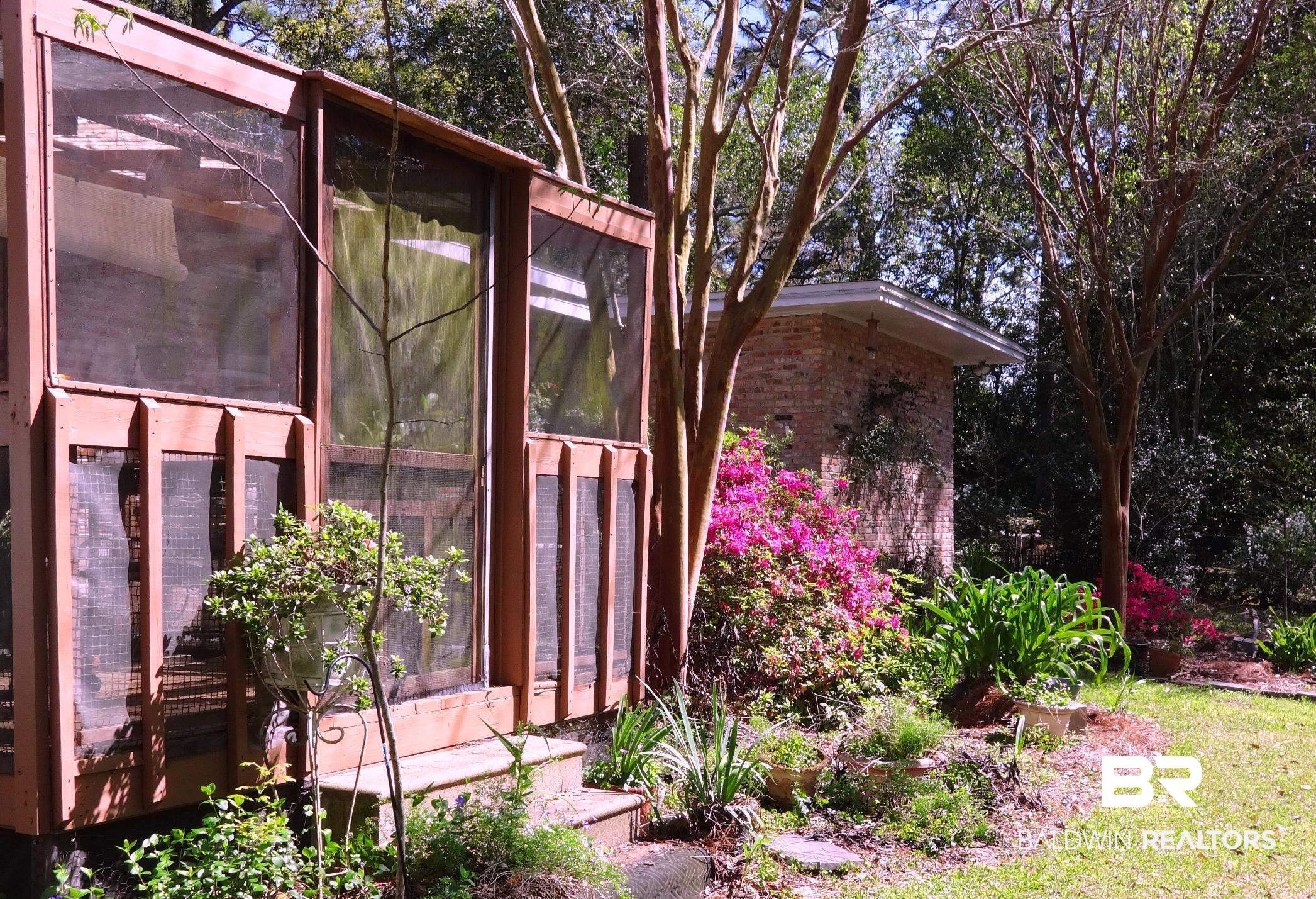 1075 Zurich Street Mobile, AL 36608 - Photo 33 of 35 View of outbuilding with a sunroom