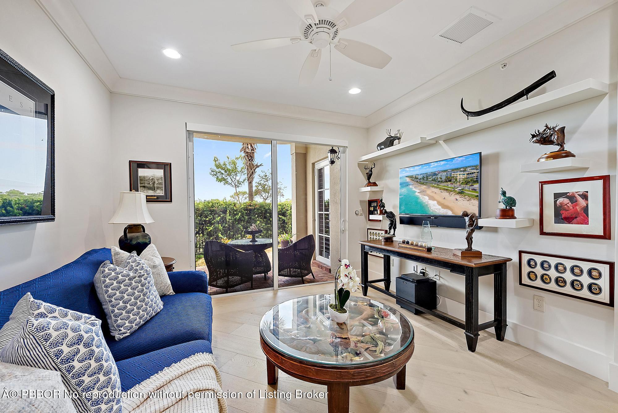 138 Tierra Lane, Unit 6 Jupiter, FL 33477 - Photo 28 of 41 a living room with furniture and a window